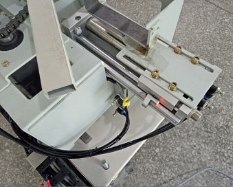 Coil strapping machine-min