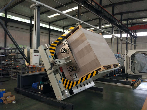 Pile turner machine for paper pile turning and pallet changing