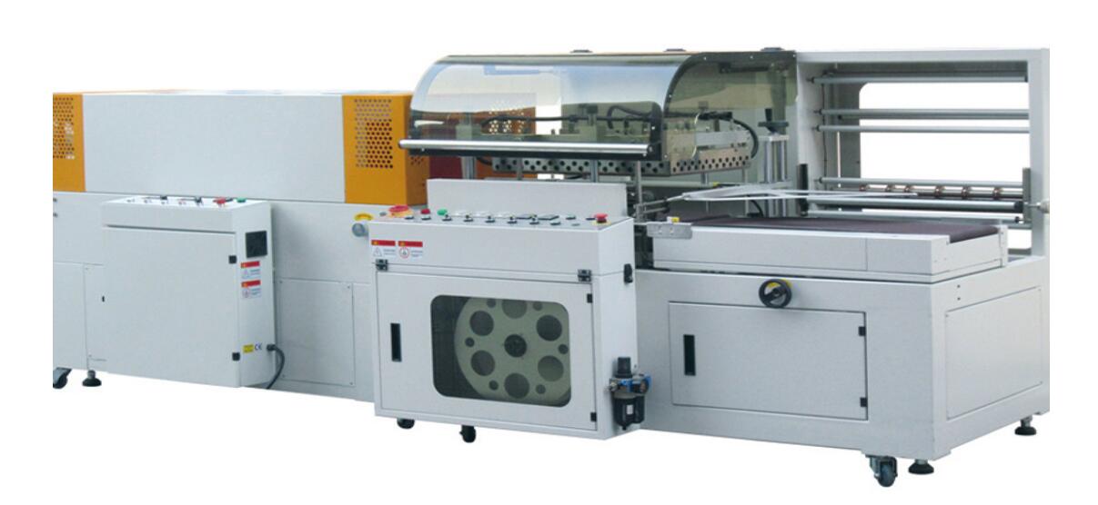 Heat shrink wrapping packaging machine