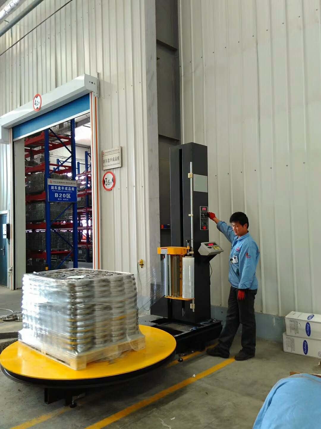 The installation of automatic pallet stretch wrapping machine with weighing scale is completed