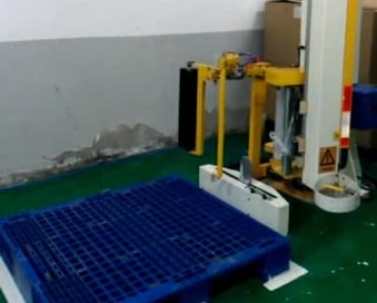 automatic film cutter of the rotary arm pallet packer