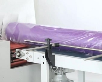 motion sealer for side sealing and wrapping
