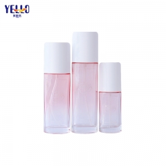 Venta al por mayor Gradient Pink Glass 30ml Frascos cosméticos y botellas de loción con bomba