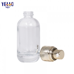 Botella de envases de loción de vidrio transparente de 30 ml, botellas de suero de bomba de oro