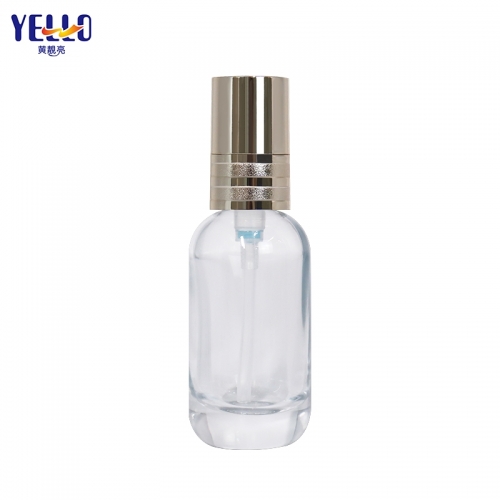 Botella de envases de loción de vidrio transparente de 30 ml, botellas de suero de bomba de oro