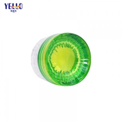 Frascos de crema de vidrio amarillo verde de lujo y botellas de loción con bomba