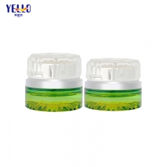 Frascos de crema de vidrio amarillo verde de lujo y botellas de loción con bomba