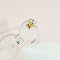 99951 - Diamond butterfly half rim titanium frame for Lady