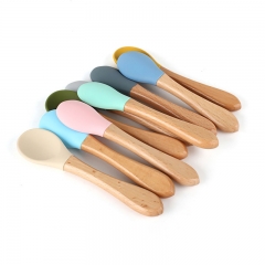 Silicone baby spoon with wooden handle