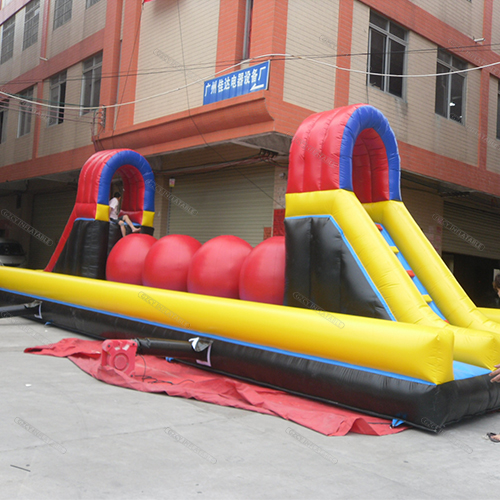 Big balls wipeout run inflatable obstacle course