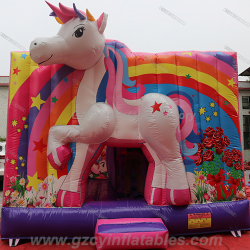 Casa de rebote de unicornio con tobogán