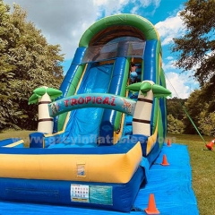 Tall tropical palm tree inflatable water slide with pool
