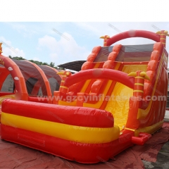 Orange inflatable bouncy castle with water double slides
