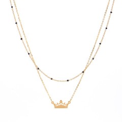 Crown pendant with black resin bead chain layered necklace