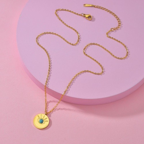 Eye medallion with turqoise stainless steel necklace in gold plating