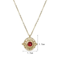 Vintage sunburst medallion with red agate necklace in steel