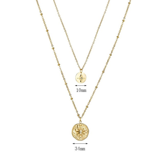 Hammered sun medallion and north star medal layered necklace