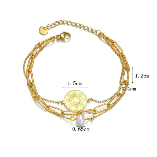 Triple layered chain bracelet with sunburst medallion and pearl