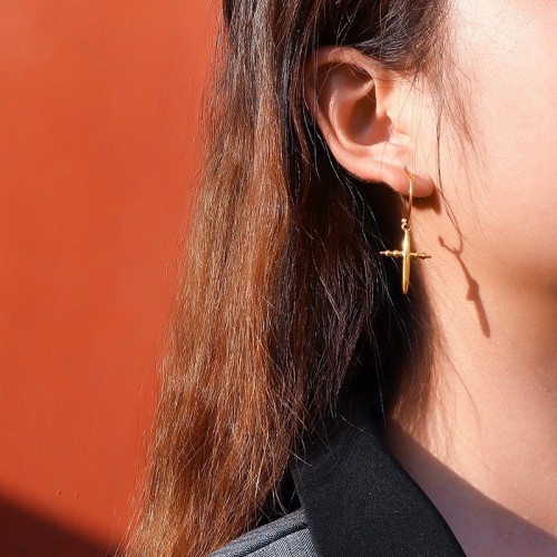 Polished cross charm hoop earrings in gold plating