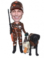 Hunter bobblehead with his dog