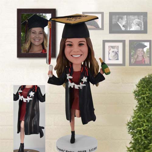 Happy Graduation Bobblehead with one leg heel raise and champagne