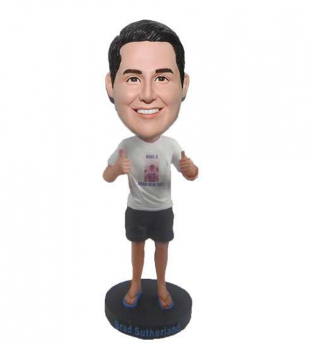 Bobble head doll with thumbs up