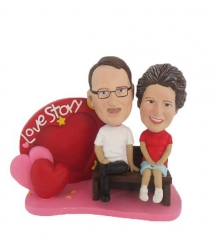 Anniversary bobblehead cake toppers
