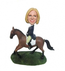 Bubblehead doll on horse