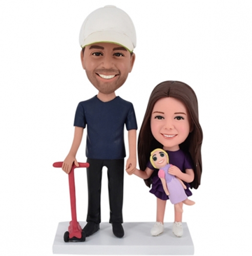 Bobbleheads with Daughter and Dad holding scooter
