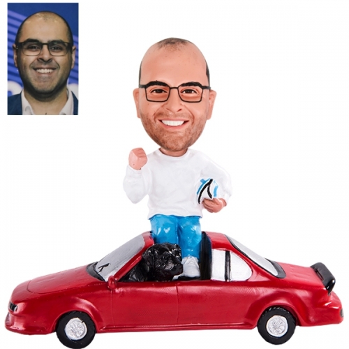 Custom Bobble head sitting on car