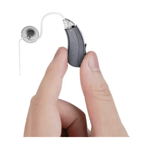 Rechargeable BTE hearing aid housing held in the hand, showing the rocker control