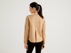 JACKET WITH PLEAT ON THE BACK