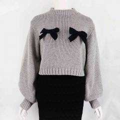 SWEATER WITH BOWS