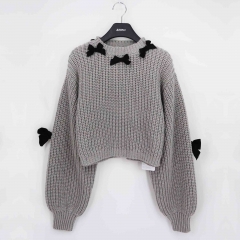 SWEATER WITH BOWS