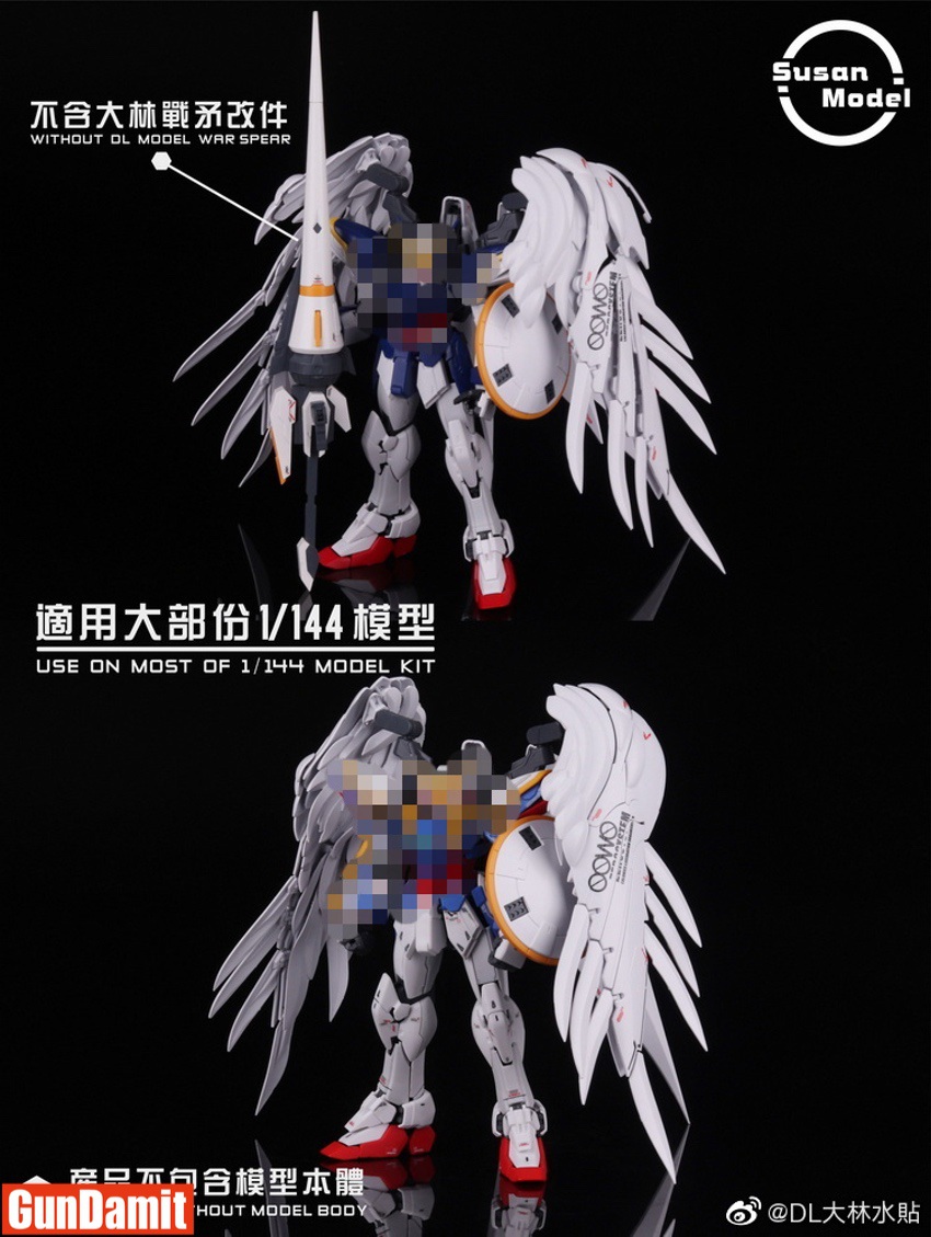 White wings attached to 1/144 RG Gundam showing front and back compatibility demonstration White wings attached to 1/144 RG Gundam showing front and back compatibility demonstration
