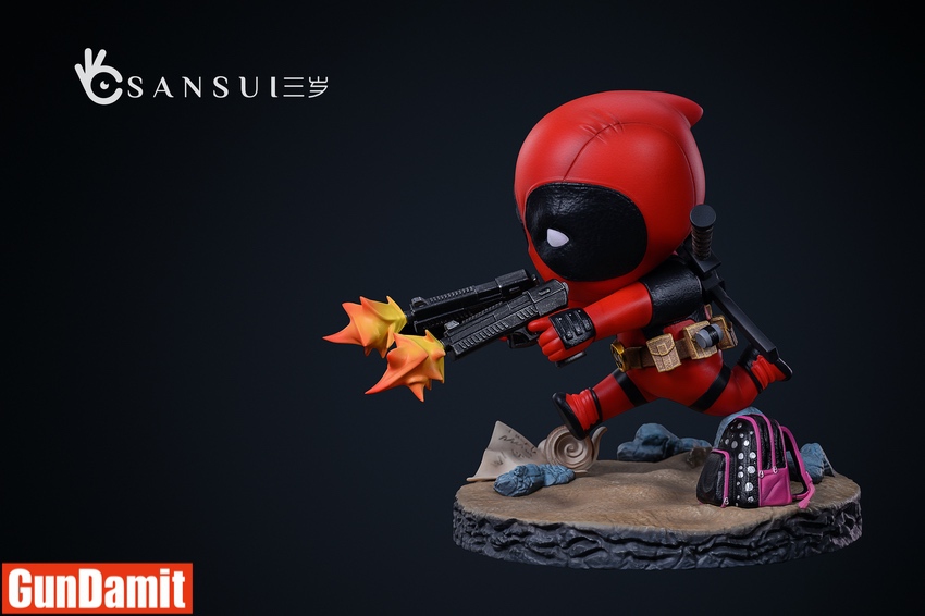 Mini Deadpool SD statue front angle showing cute chibi design with gun katana belt pouches and pink handbag accessory Mini Deadpool SD statue front angle showing cute chibi design with gun katana belt pouches and pink handbag accessory