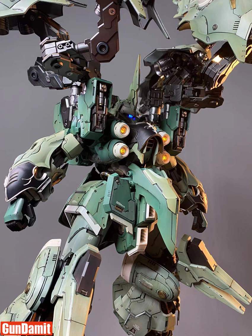 Front torso detail of Kshatriya with illuminated yellow thrusters and green armor paneling Front torso detail of Kshatriya with illuminated yellow thrusters and green armor paneling