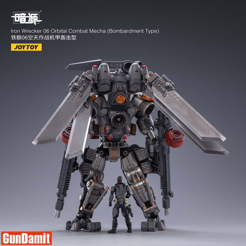 Side angle of Iron Wrecker 06 Bombardment mecha holding heavy machine gun with pilot standing below Side angle of Iron Wrecker 06 Bombardment mecha holding heavy machine gun with pilot standing below