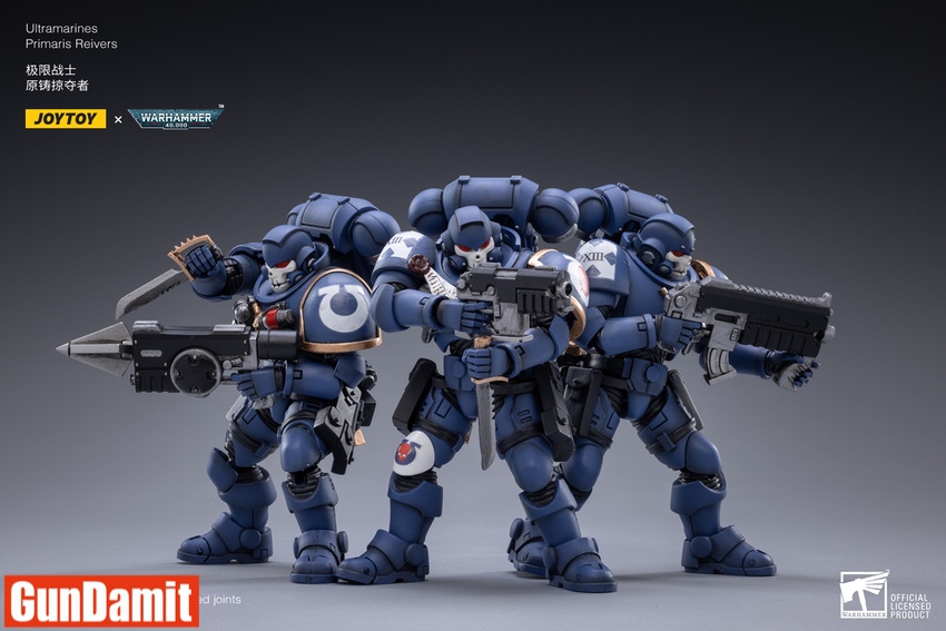 Three Ultramarines Reivers from rear angle showing chapter markings and tactical equipment on blue armor Three Ultramarines Reivers from rear angle showing chapter markings and tactical equipment on blue armor