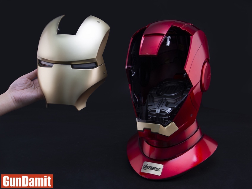 MST Iron Man MK7 helmet with removable gold faceplate on display base showing internal speaker MST Iron Man MK7 helmet with removable gold faceplate on display base showing internal speaker