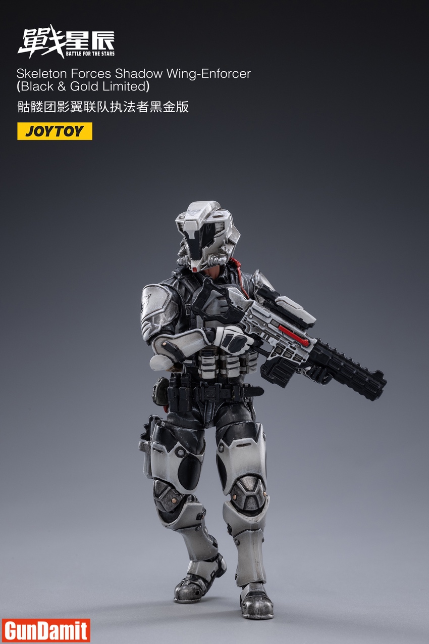 JoyToy Wing-Enforcer Black Gold walking pose holding assault rifle JoyToy Wing-Enforcer Black Gold walking pose holding assault rifle