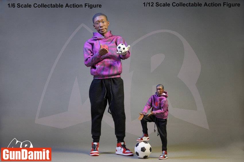 Both scale Mr. No Say figures posed with soccer balls showing size comparison Both scale Mr. No Say figures posed with soccer balls showing size comparison
