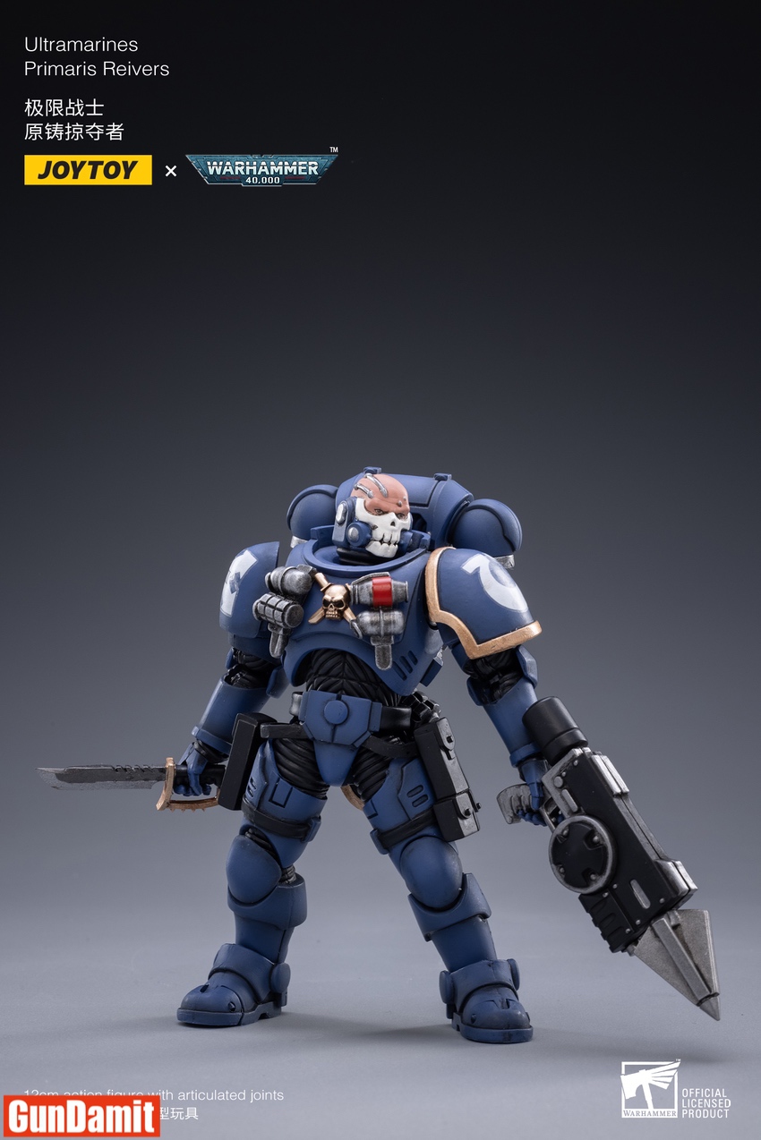 Solo Ultramarines Reiver standing with combat knife and grapnel launcher in dark blue Phobos armor Solo Ultramarines Reiver standing with combat knife and grapnel launcher in dark blue Phobos armor