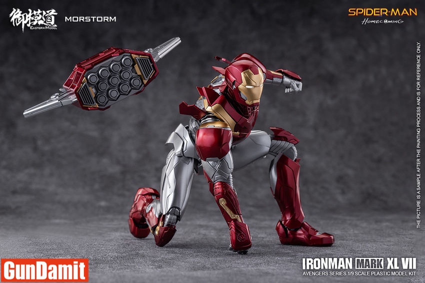 Iron Man Mark 47 in crouching combat pose with arm-mounted missile launcher deployed Iron Man Mark 47 in crouching combat pose with arm-mounted missile launcher deployed