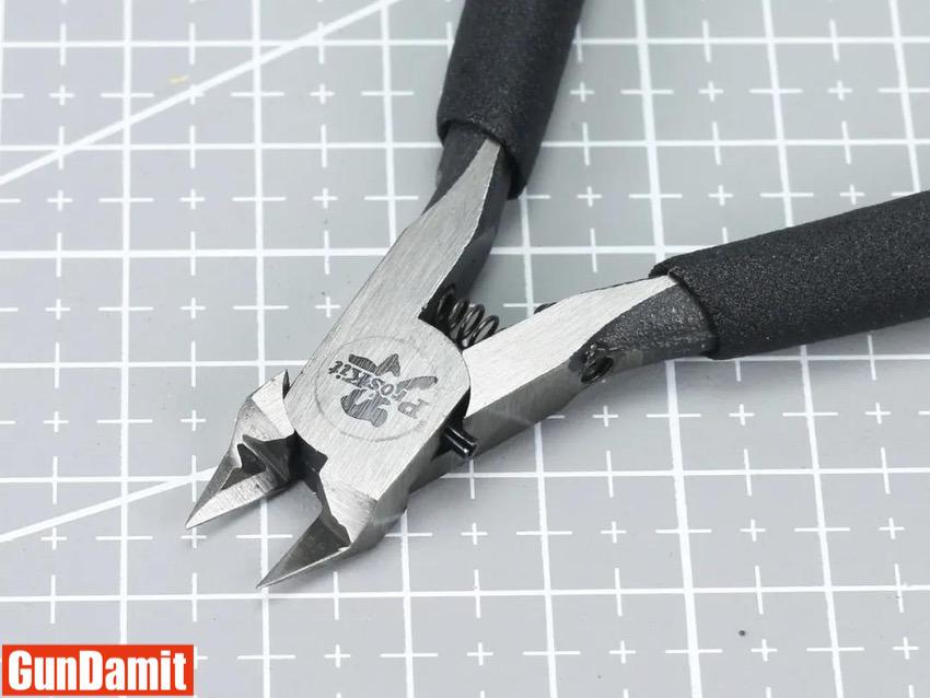 Pro'sKit Takuminoha nipper side angle showing spring mechanism and blade profile Pro'sKit Takuminoha nipper side angle showing spring mechanism and blade profile
