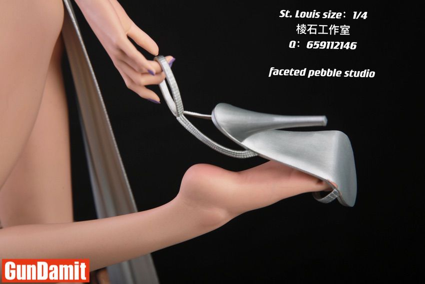 St. Louis statue silver high heel shoe detail close-up St. Louis statue silver high heel shoe detail close-up