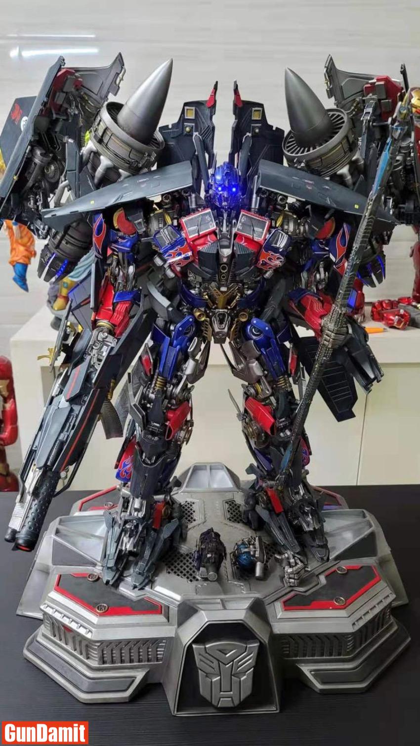 HEAT Studio Jetpower Optimus Prime full frontal view with spread wings and weapons HEAT Studio Jetpower Optimus Prime full frontal view with spread wings and weapons