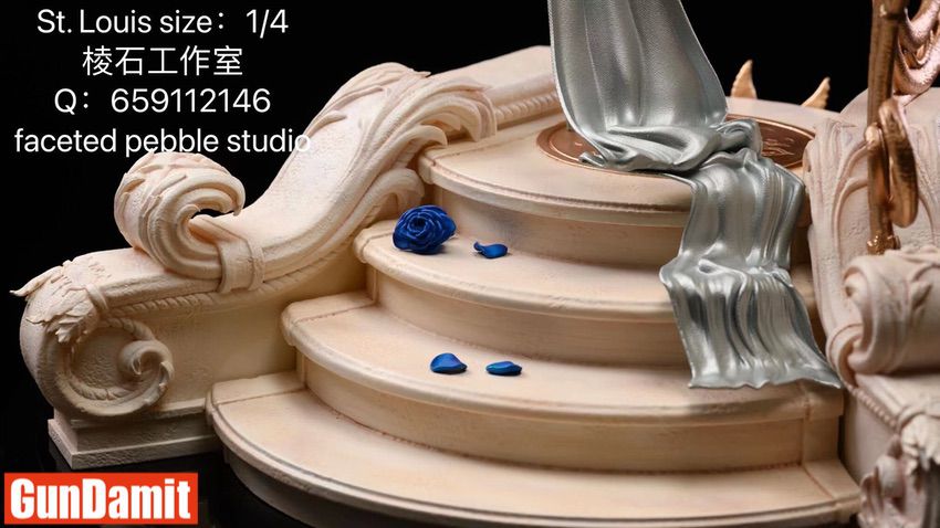 Close-up of baroque base with blue roses and silver fabric detail Close-up of baroque base with blue roses and silver fabric detail