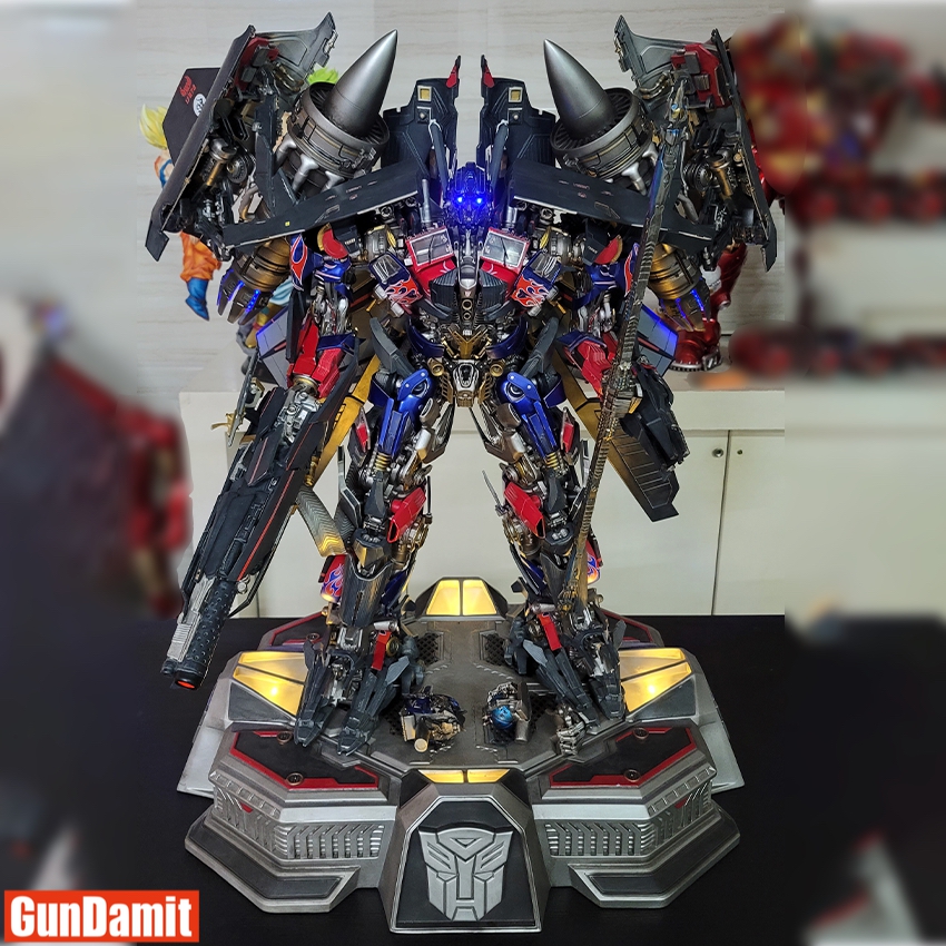 HEAT Studio Jetpower Optimus Prime Custom Statue front view with LED chest light and Autobot base HEAT Studio Jetpower Optimus Prime Custom Statue front view with LED chest light and Autobot base