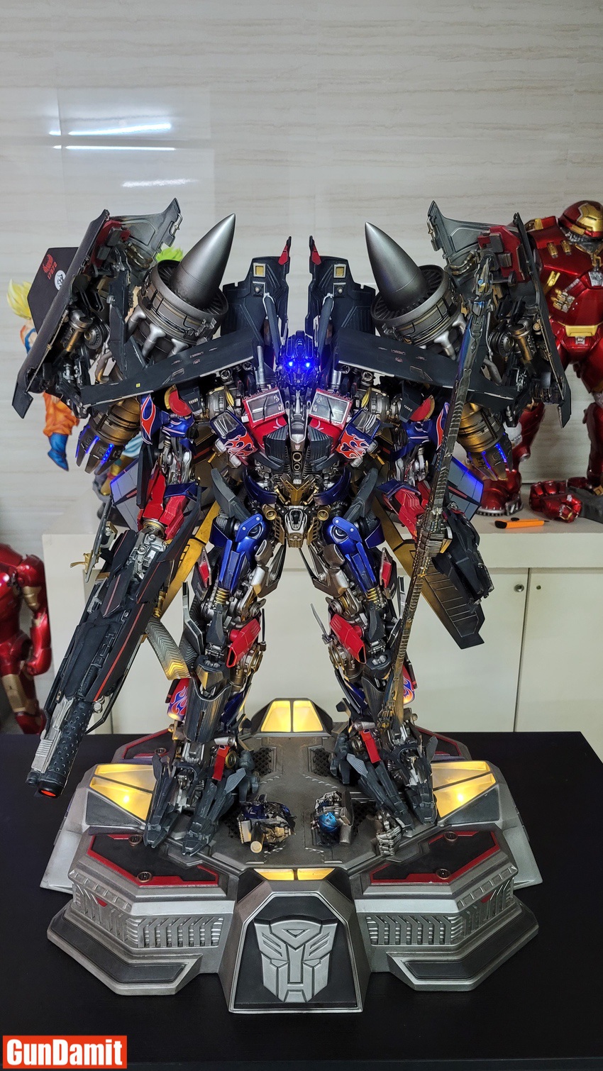 HEAT Studio Jetpower Optimus Prime statue full height side angle with jet pack wings HEAT Studio Jetpower Optimus Prime statue full height side angle with jet pack wings